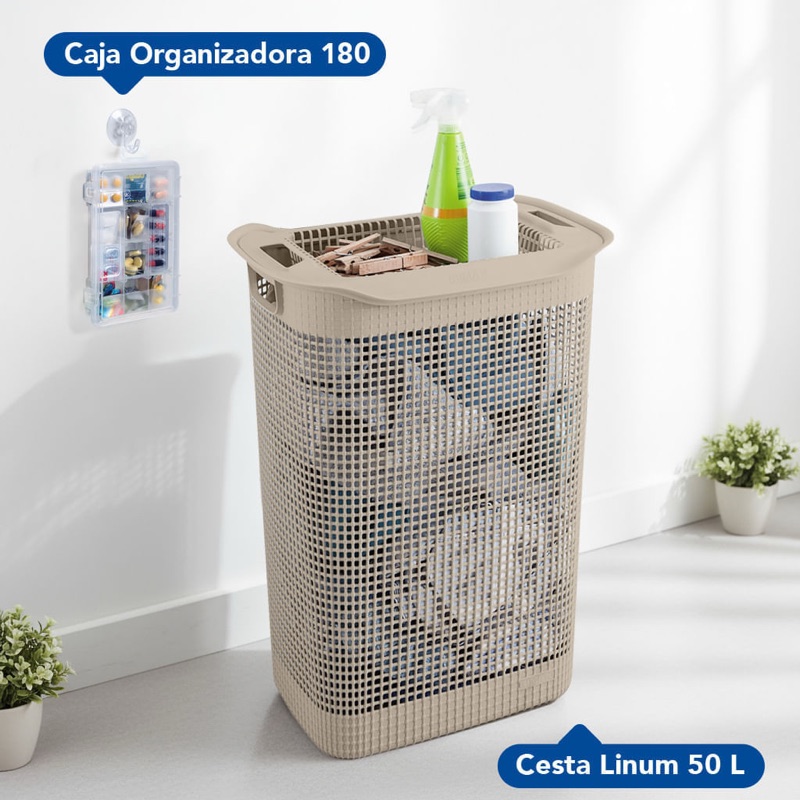 Laundry organizer set, with a beige 50 L Linum hamper and a clear organizer box hung on the wall